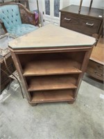 Unusual corner bookcase with custom cut glass t