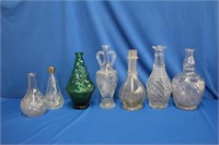 Seven glass vases, 11.5 down to 7.5"H
