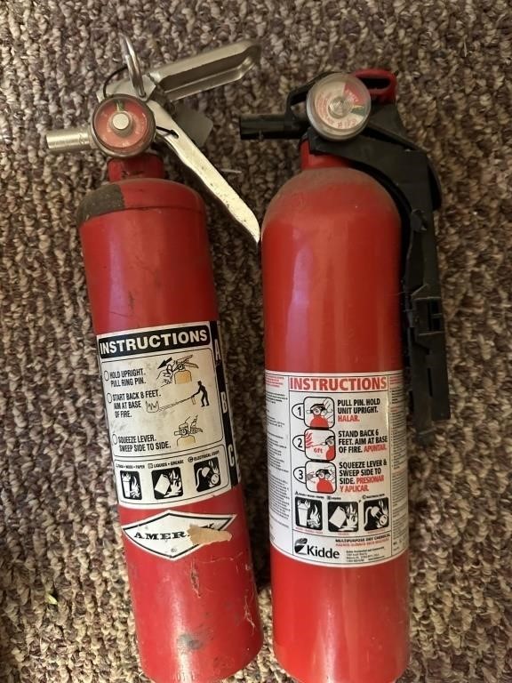 Two Kitchen Size Fire Extinguishers    K