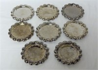 Set of 8 Round Metallic Ashtrays?