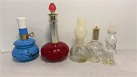 Five Avon decanters, two with perfume/cologne