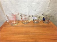 Set of 4 glass measuring pitchers