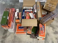 large lot of empty train boxes and broken display