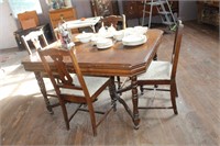 ANTIQUE DINING ROOM TABLE AND FOUR CHAIRS