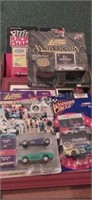 Lot with model race cars and racing signed