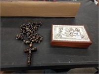 Wooden box with cross necklace
