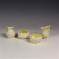 Two sets of Belleek creamer and sugar