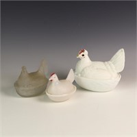 Three vintage nesting glass hens
