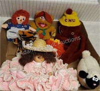 Assorted vintage dolls and stuffed animals