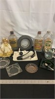 Vintage bottles, ashtrays, music wind up doll