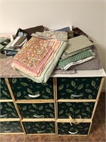 Two 3-drawer boxes of fabric/material