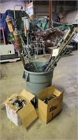 Assorted Tiki torches and accessories