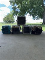 Dog house and five pet carriers