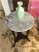 Marble top stand and vase