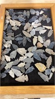 Display case of arrowheads