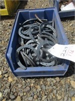 229) Box full of horse shoes