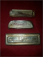 3 old harmonicas