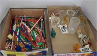 Assorted stirrers and shot glasses