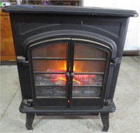 Electric fireplace looking heater, works fine