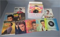 (39) Elvis Presley 45RPM records.