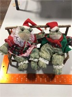 Christmas frogs on stick bench