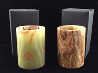 2 carved stone onyx candle holders in box.