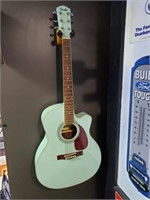 Turquoise Fender guitar