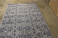 5'x8' Machine Made Polyester Rug Unused