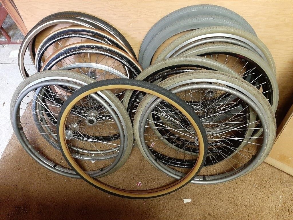 Wheelchair rims and tires; 8 rims and 5 new tires