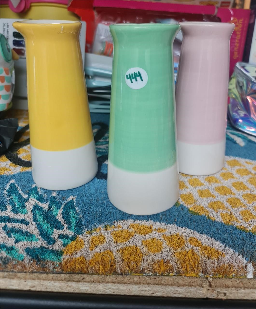 Pink green yellow vases