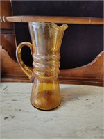 yellow glass pitcher.