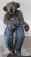 Stuffed bear with Levi jeans on. Measures: 42"H.