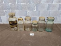 Antique blue and clear glass jars