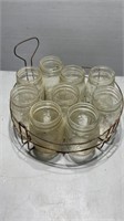 Rack of 9 small canning jars