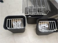 Three small trash cans with hanging racks and