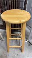 One pine barstool, 29 inches tall with a 13 inch
