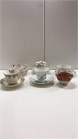 Set of 5 cups with saucer one cup without