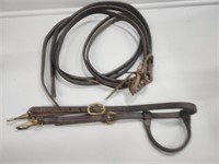 Plain brown leather headstall and reins