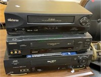 Lot of three vintage VHS players - Memorex, JVC,
