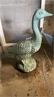 Cement  lawn ornament, neck cracked 21 “ tall