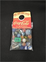 Coke Advertising glass marbles MIP