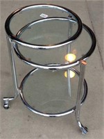 Rolling chrome glass top table stand