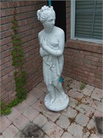 Concrete statue 47 inches tall has a chip on the