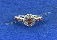 Ruby .40 ctw platinum over sterling sz 5
