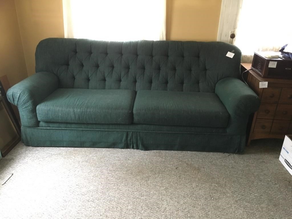 Green button-back full size sofa