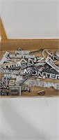 Lot of vehicle badges from various makers and