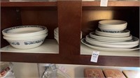 Shelf lot of Correlle glass and plates bowls