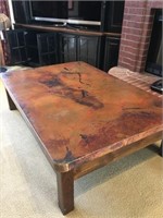 Copper like top coffee table