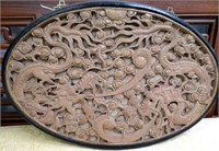 Antique large Chinese oval carved dragon plaque