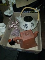 Oriental teapots and prosperity tree